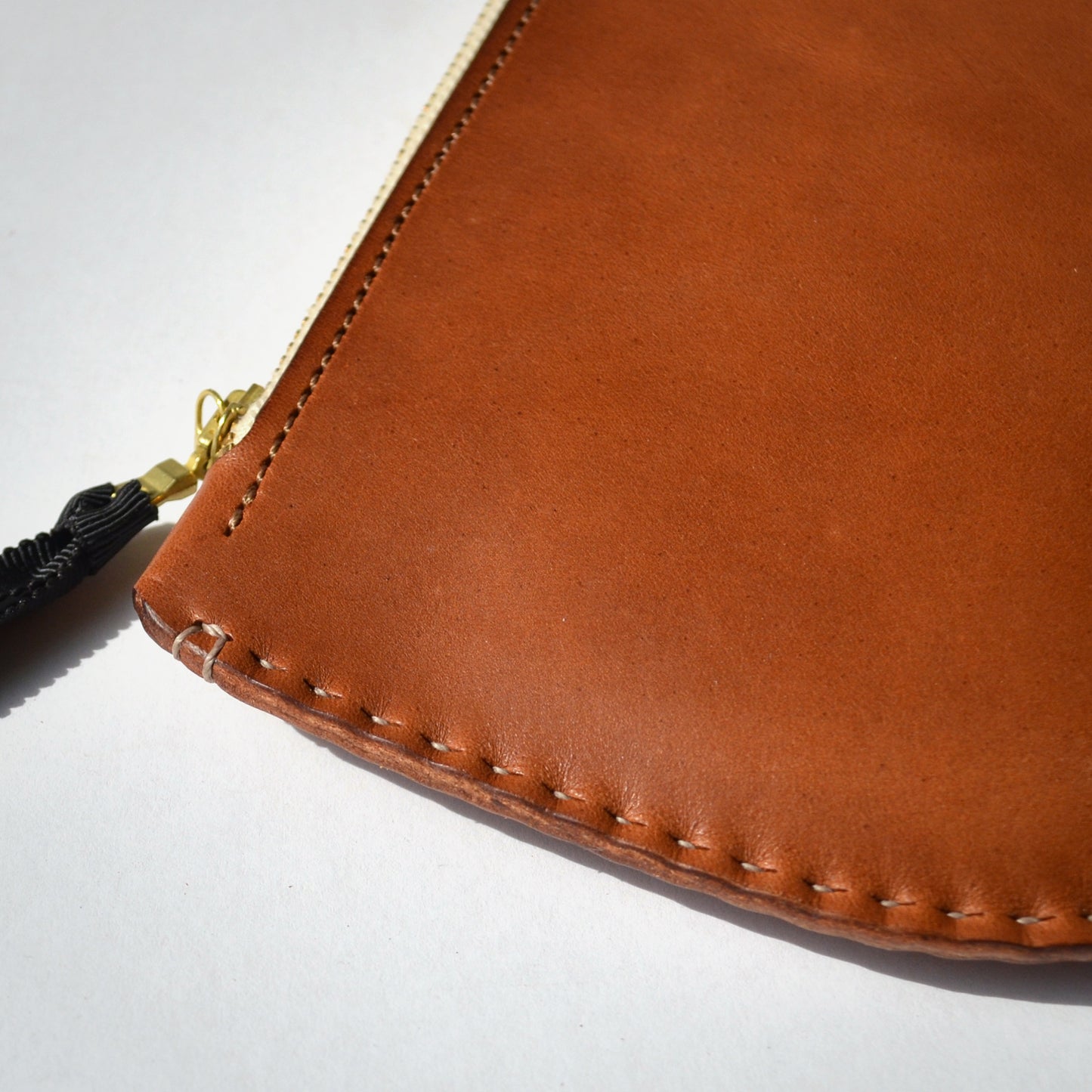 HAND-STITCHED ZIP POUCH