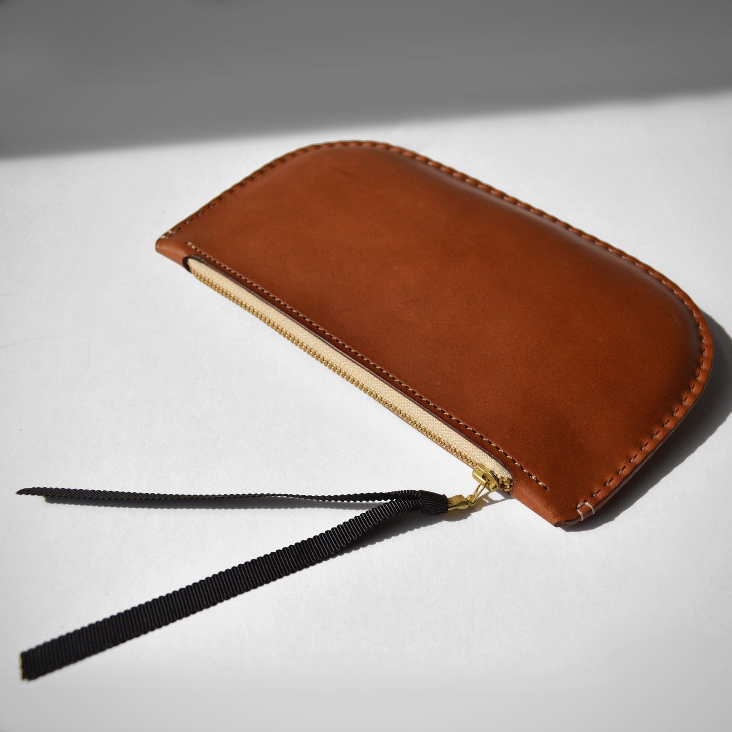 HAND-STITCHED ZIP POUCH